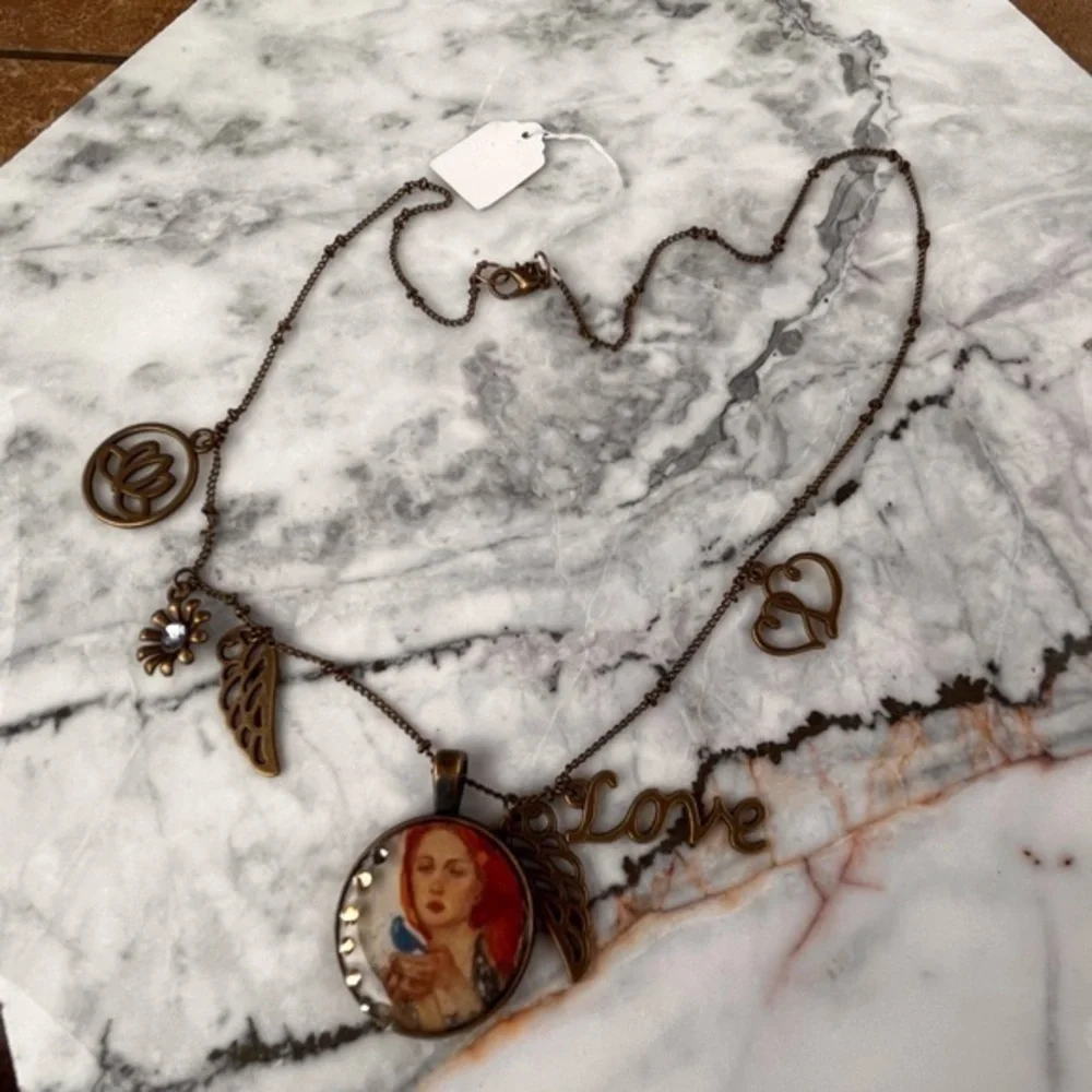Handmade necklace with portrait and charms